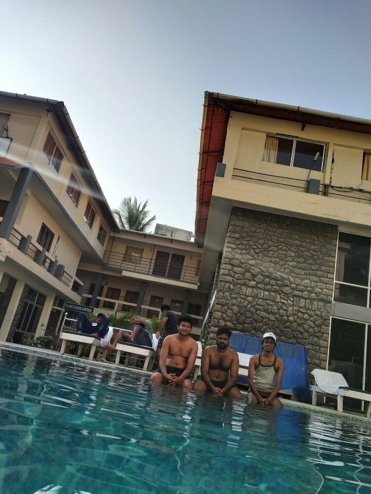 Фото New Kovalam Beach Hotel