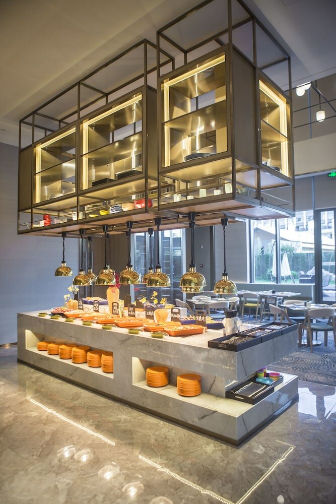 Фото The Qube Hotel Shanghai Sanjiagang