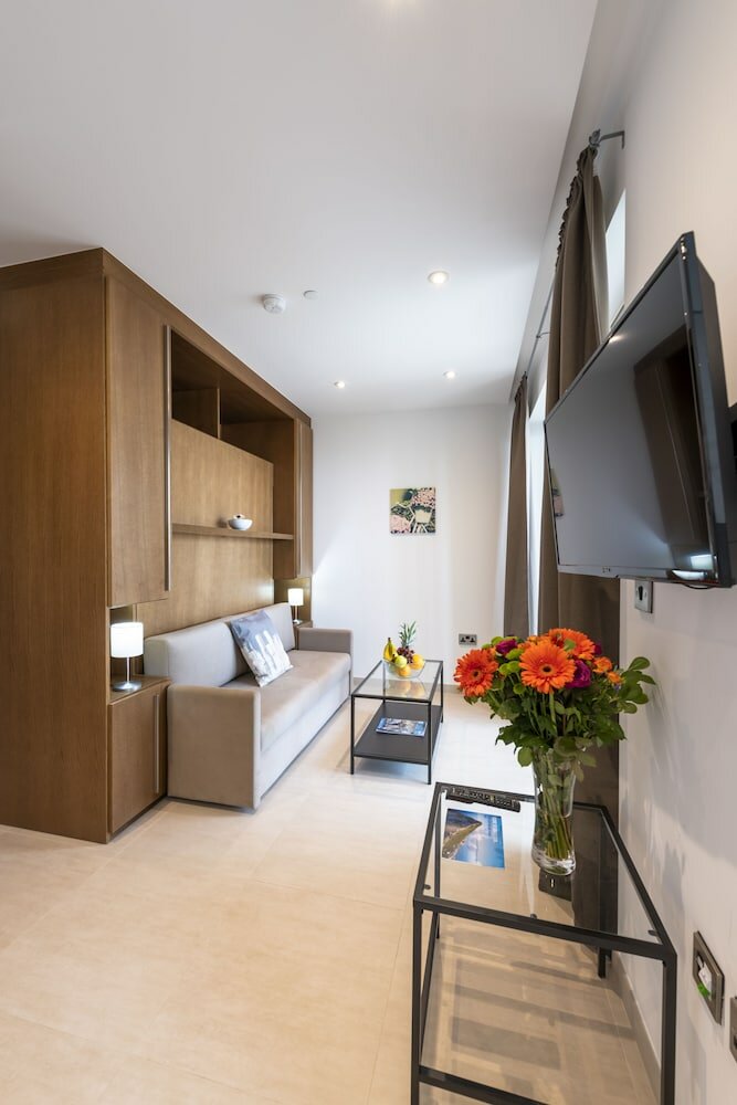 Фото Bentley Holiday Apartments - West One