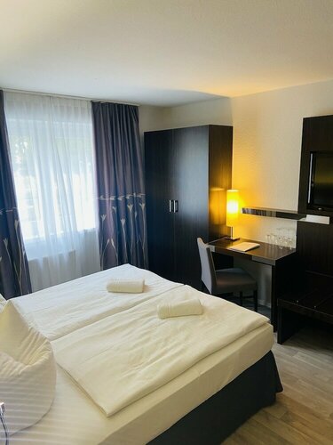 Гостиница Hotel 22 в Кётене