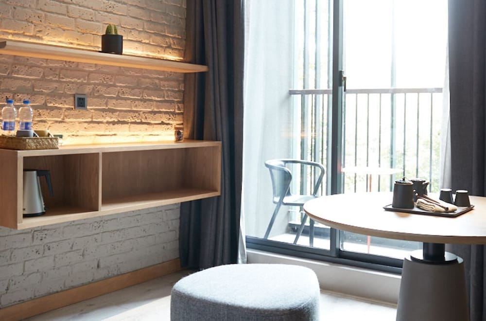 Фото Ebo Hotel Hangzhou Wulinmen