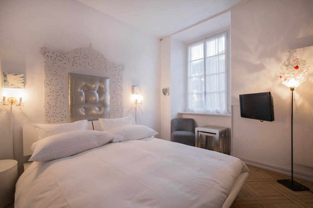 Фото Caffè dell'Arte Boutique Rooms