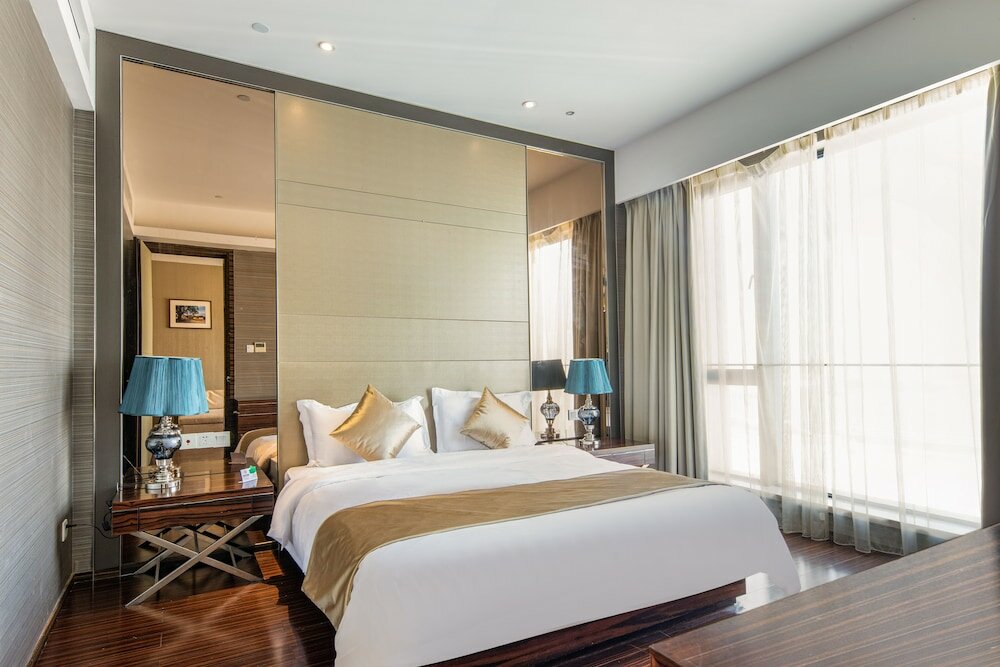 Фото Xingyi International Hotel Poly Store