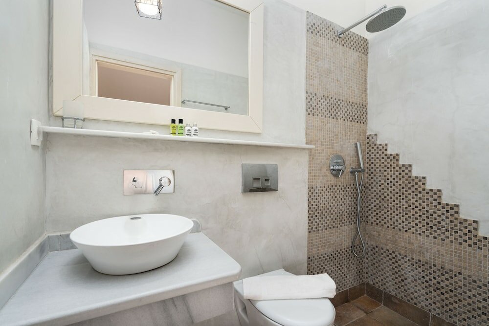 Фото Kapeli Suites