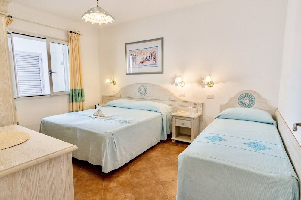 Фото Appartamenti con Wifi e A. C a Orosei