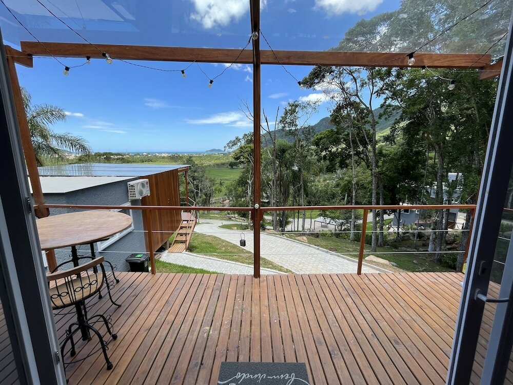 Фото Casa de Vidro - Hospedar com Propósito