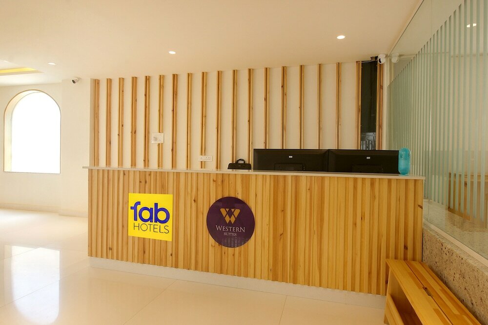 Фото Fabhotel Western Suites