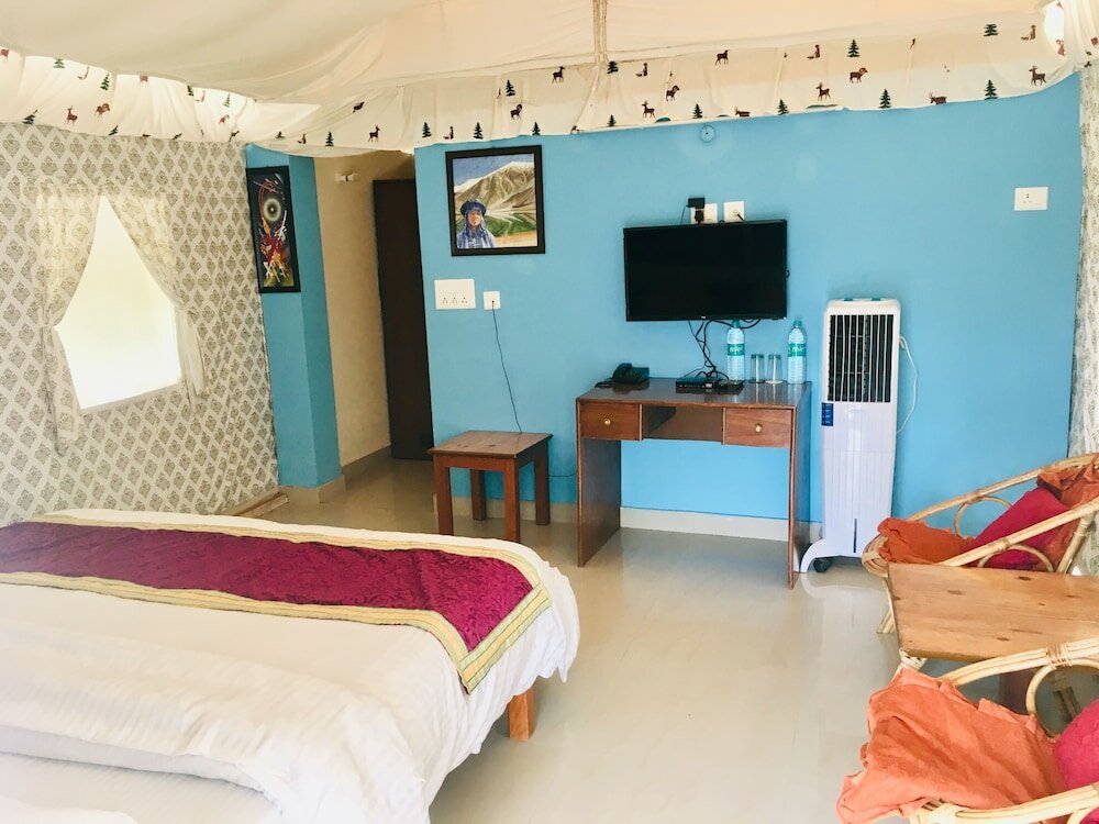 Фото Tatva Bir Tents and Hotel