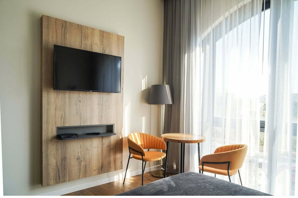 Фото Apartique Hotel