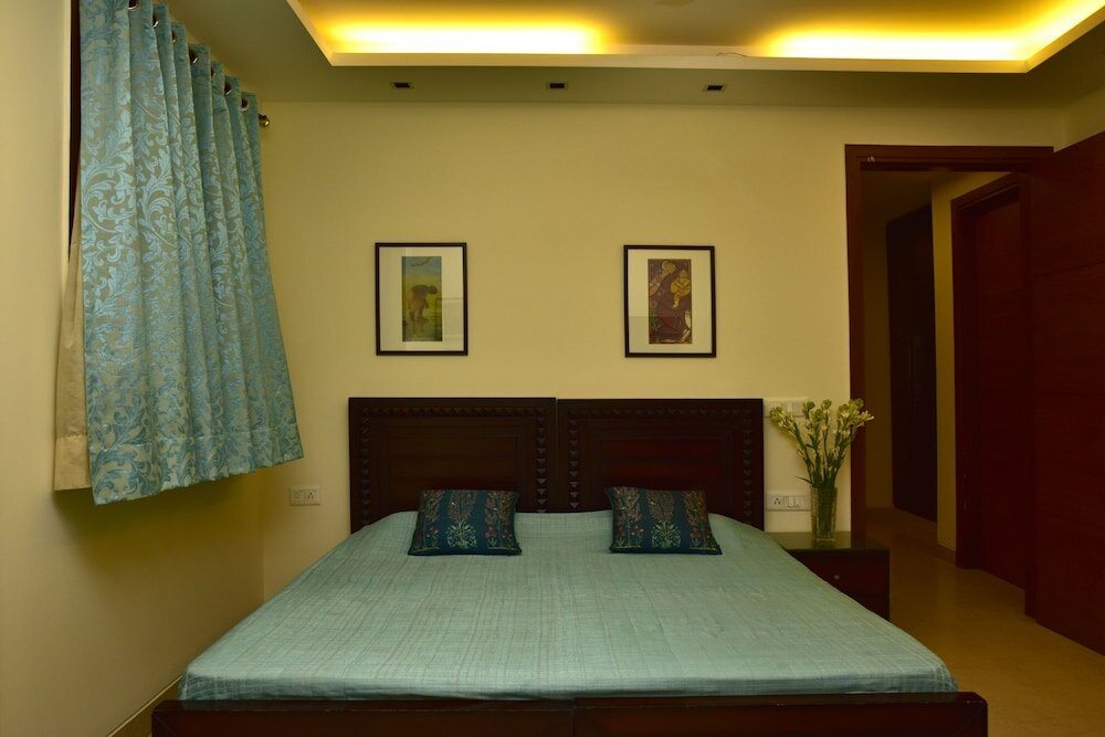 Фото Woodpecker Service Apartments Green Park