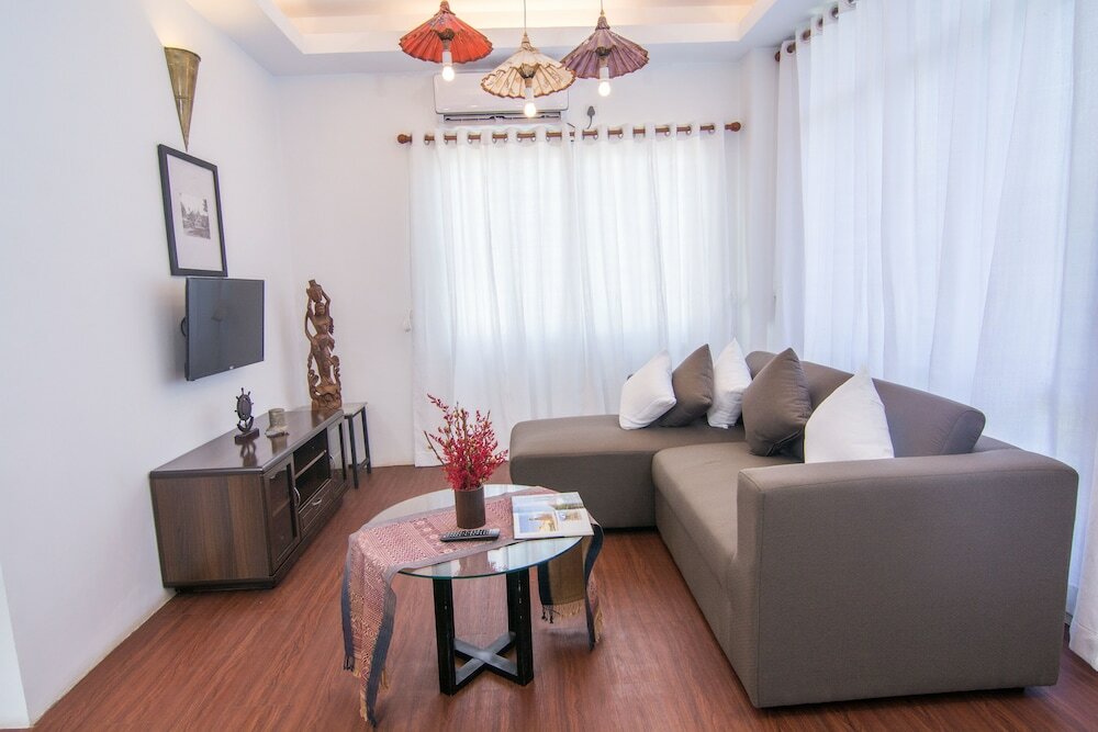 Фото Woodside Inn & Serviced Apartments