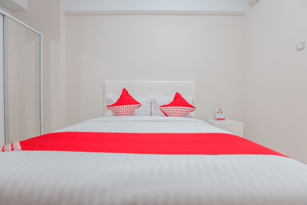 Фото Oyo 498 Green Lake View Ciputat Syariah