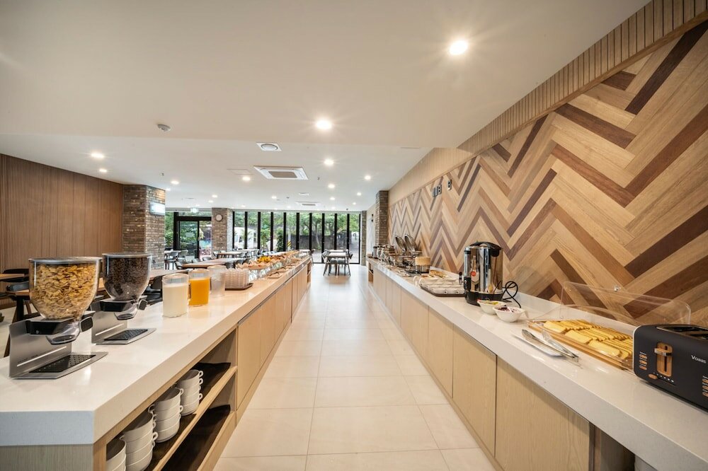 Фото Aroomi Hotel