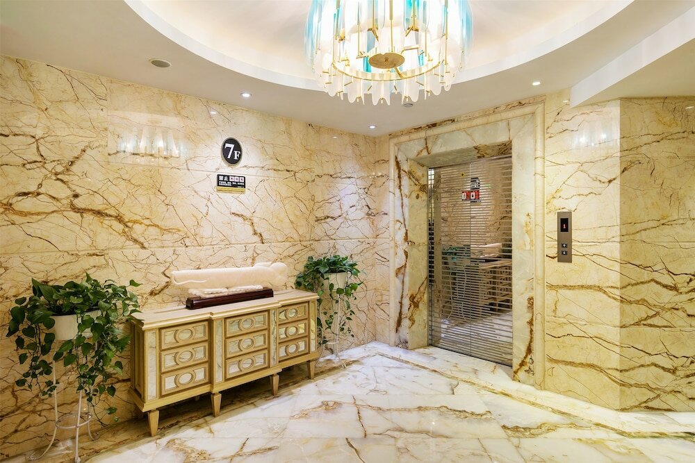 Фото Hangzhou Jinchen Yuqi Hotel