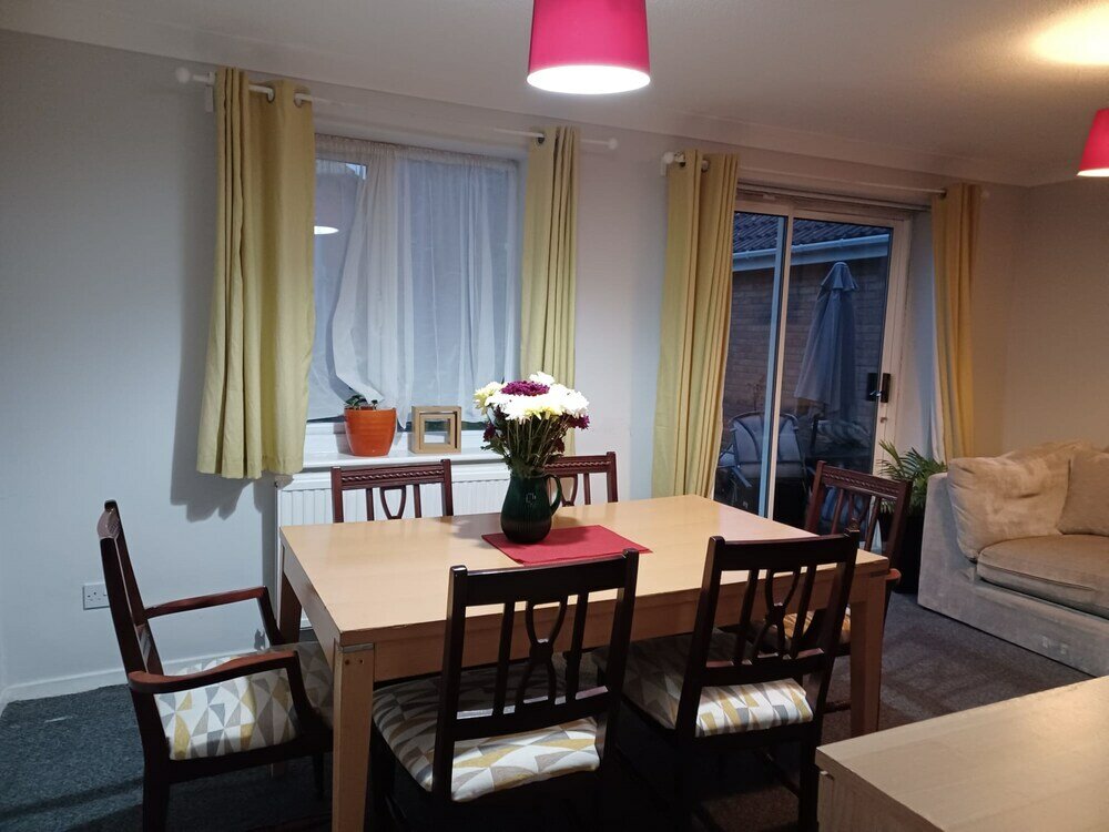 Фото Huku Kwetu - Fieldfare Green