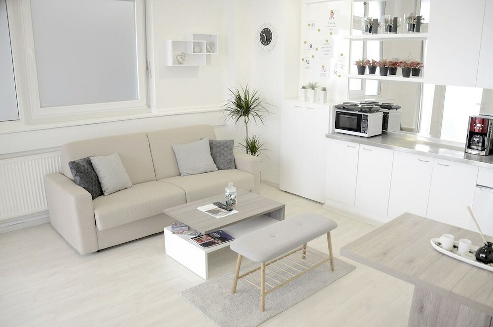 Фото B Apartment