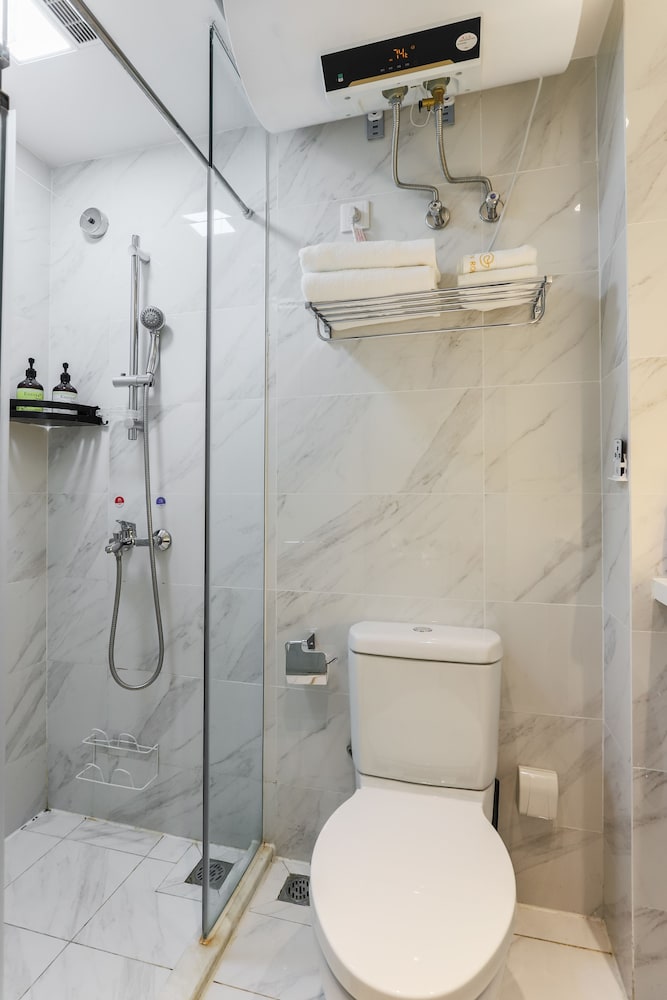 Фото Yue Qi Hotel Apartment