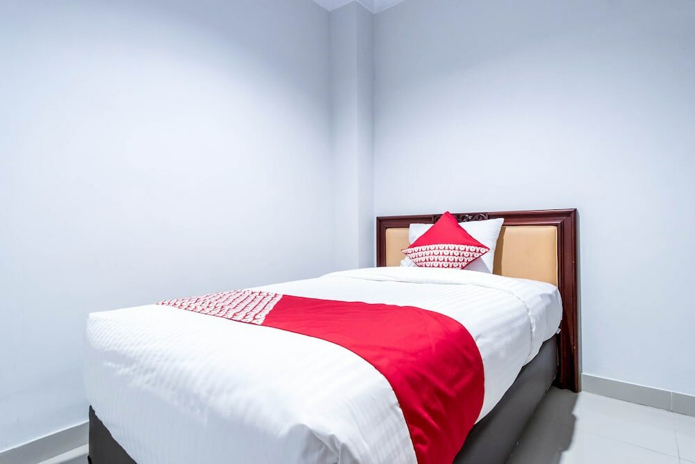 Фото Oyo 283 Helvetia Residence