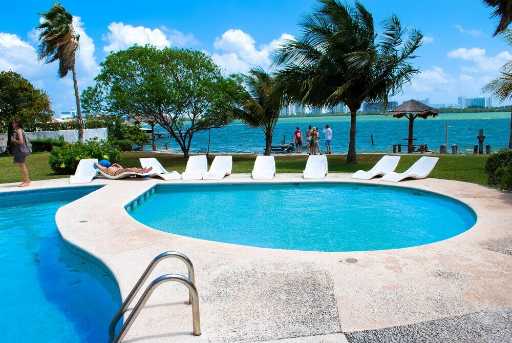 Фото Pok-Ta-Pok Guest House