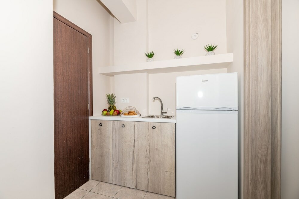 Фото Mouria Studios & Apartments