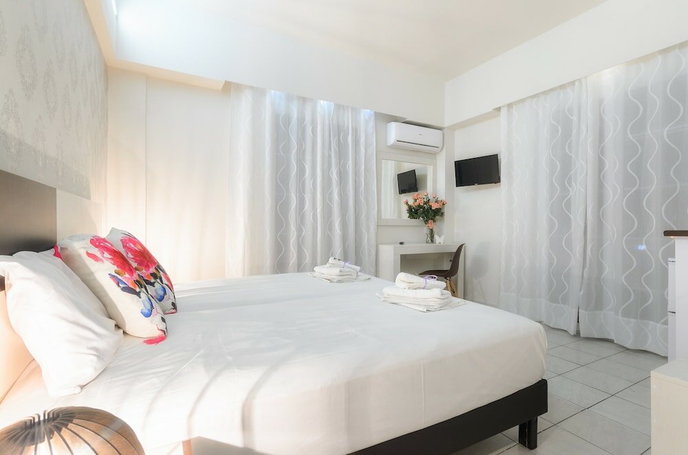 Фото Mouria Studios & Apartments