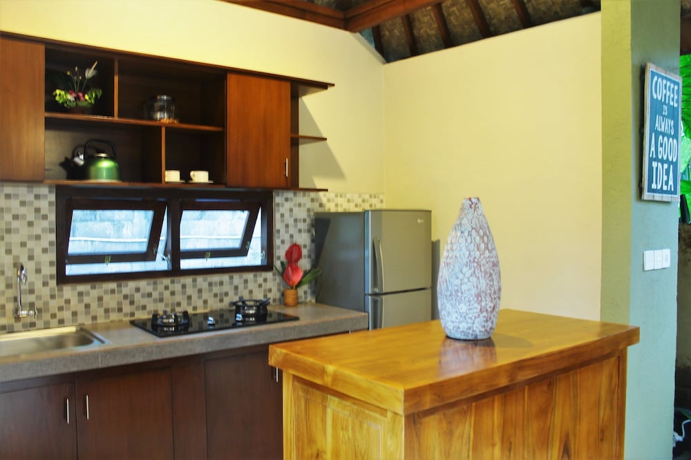 Фото Tuga Guest House Ubud