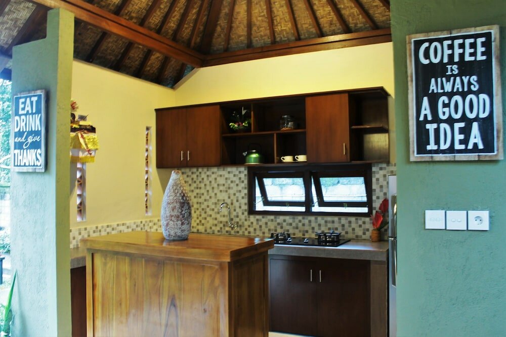 Фото Tuga Guest House Ubud