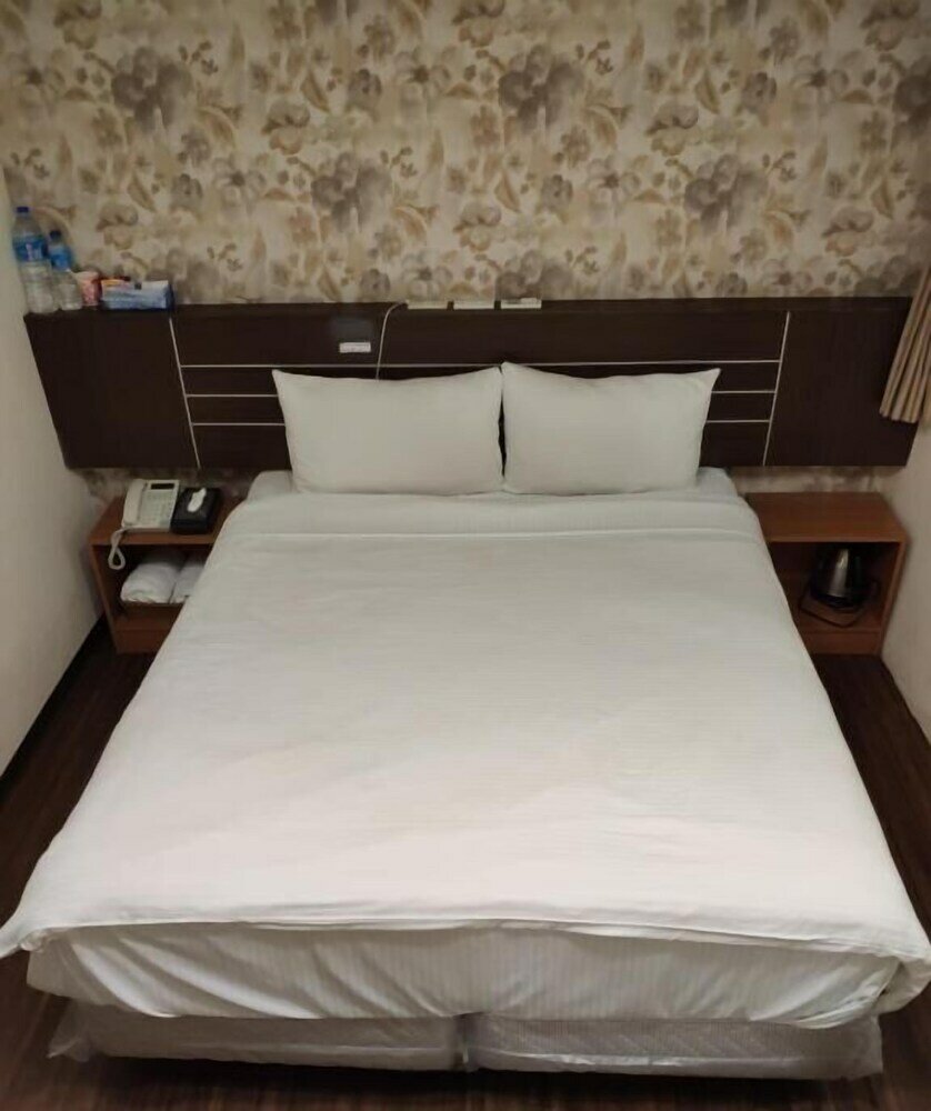 Фото Jhong-Sing Hotel