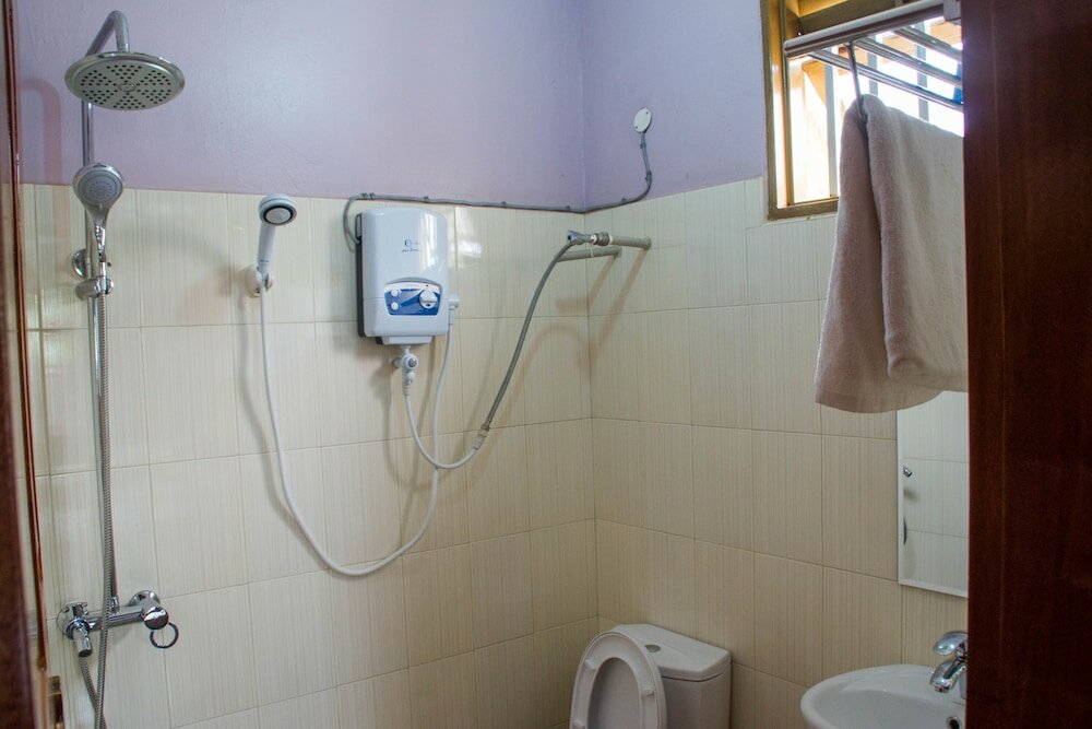 Фото Homely Nest Hotel