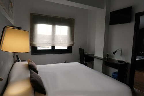 Гостиница Suites A Coruña в Ла-Корунье