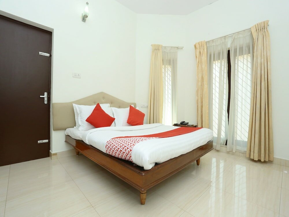 Фото Oyo 11528 Kovlam Park