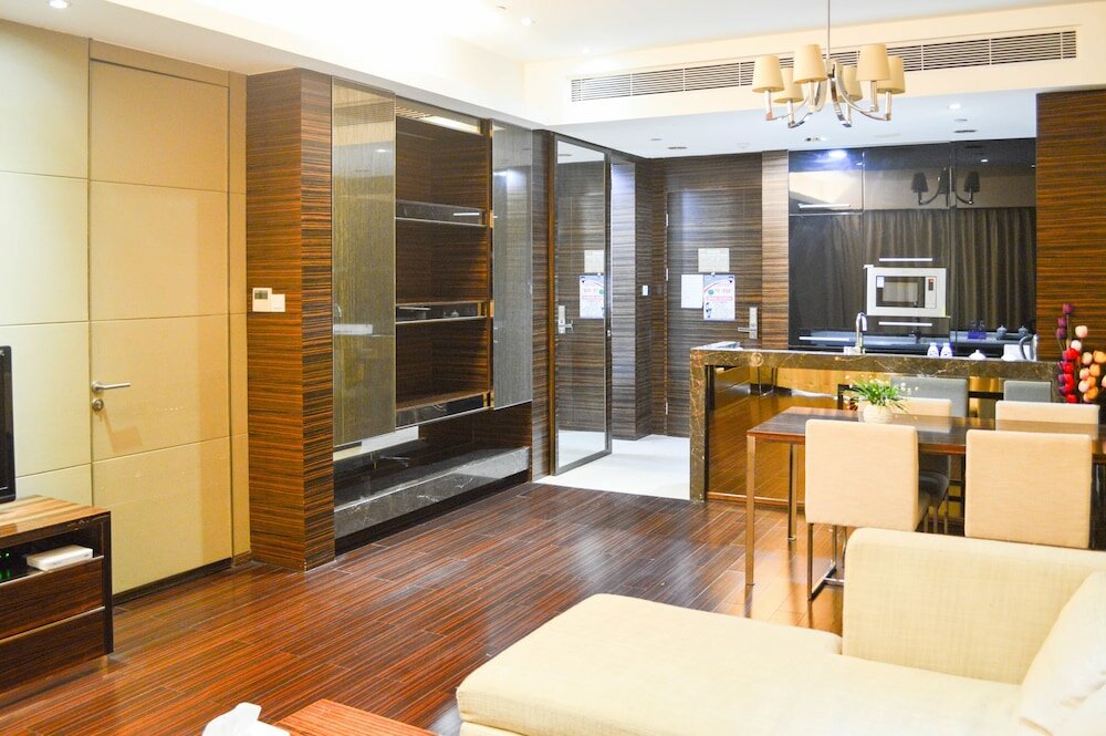 Фото Xingyi International Hotel Poly Store