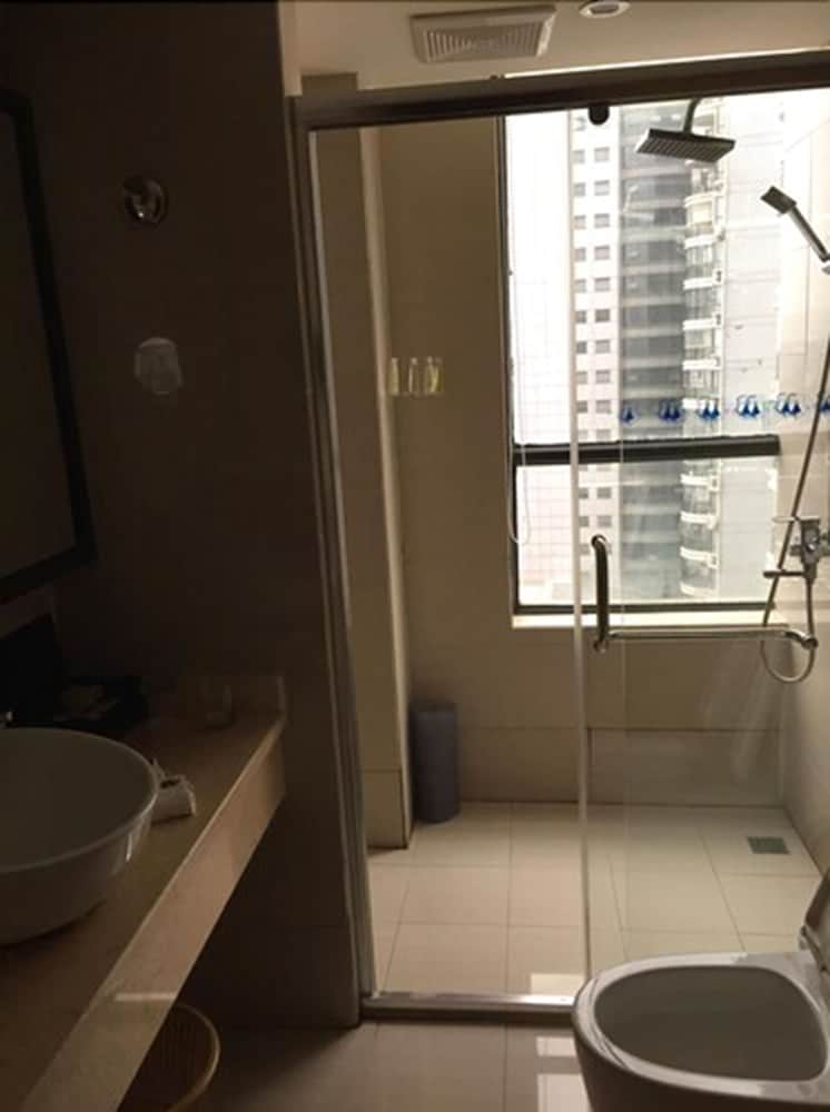 Фото New Beacon Xu Dong International Hotel