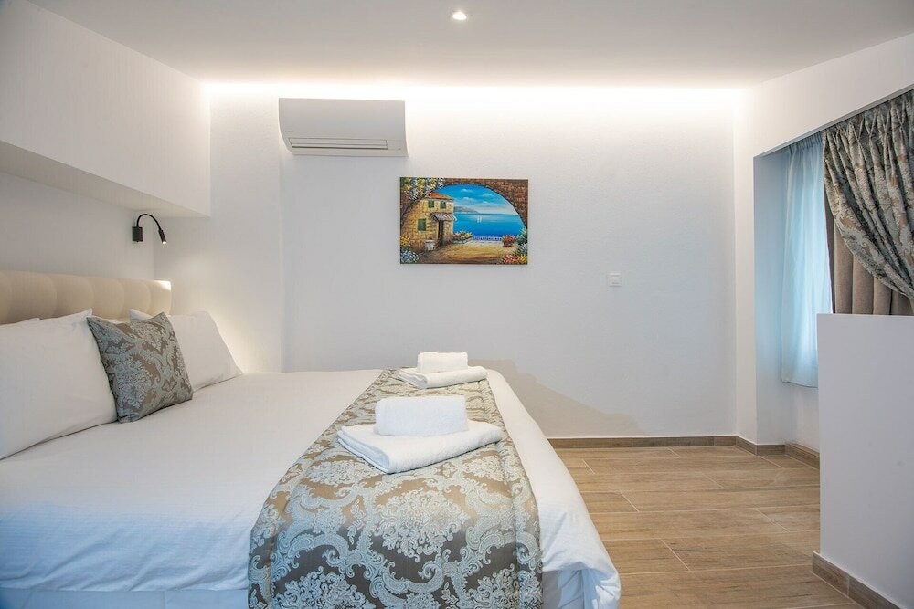 Фото Ammos Luxury Suites