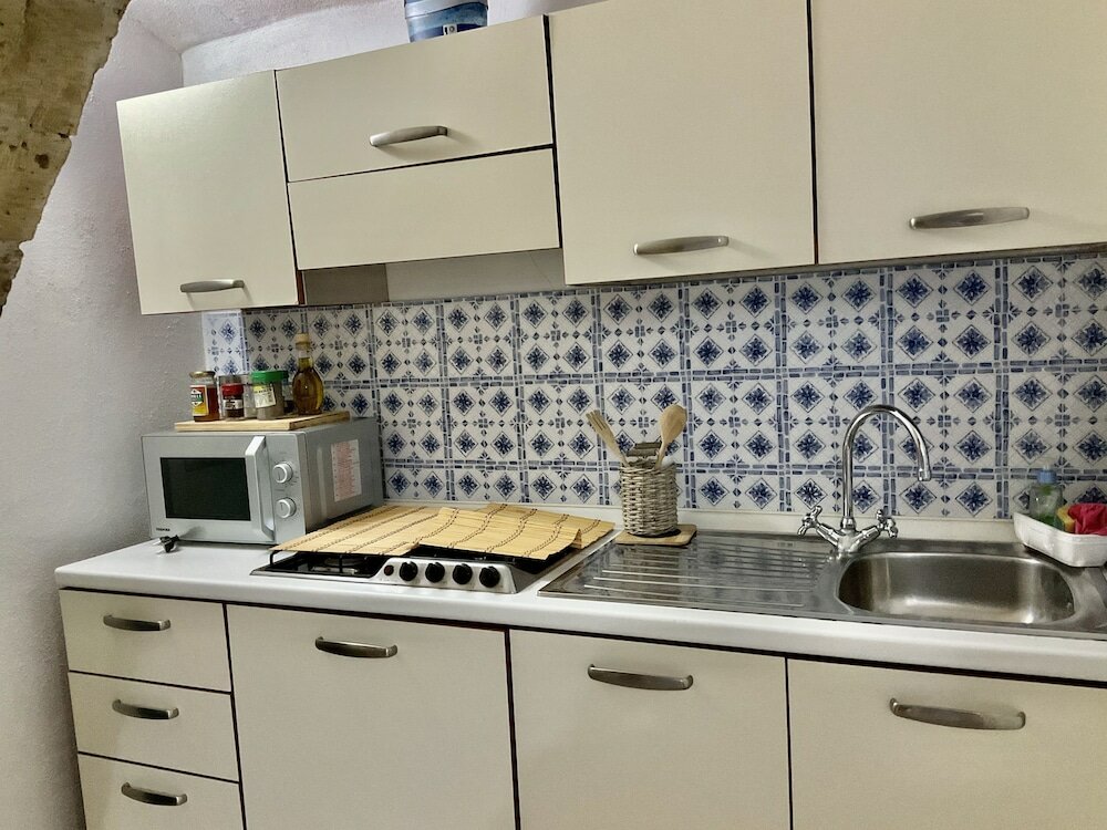 Фото A Room de Scugnizzi