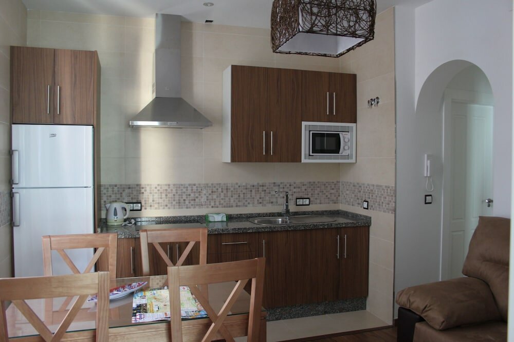 Фото Apartamentos Casa de la Lonja