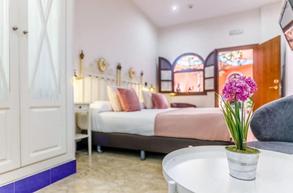 Фото Hotel Patio de la Alameda