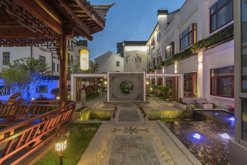 Фото Hejing Chengshang Generations Hotel