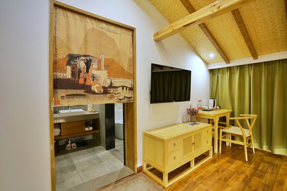 Фото Yuexijiang Boutique Holiday Hotel