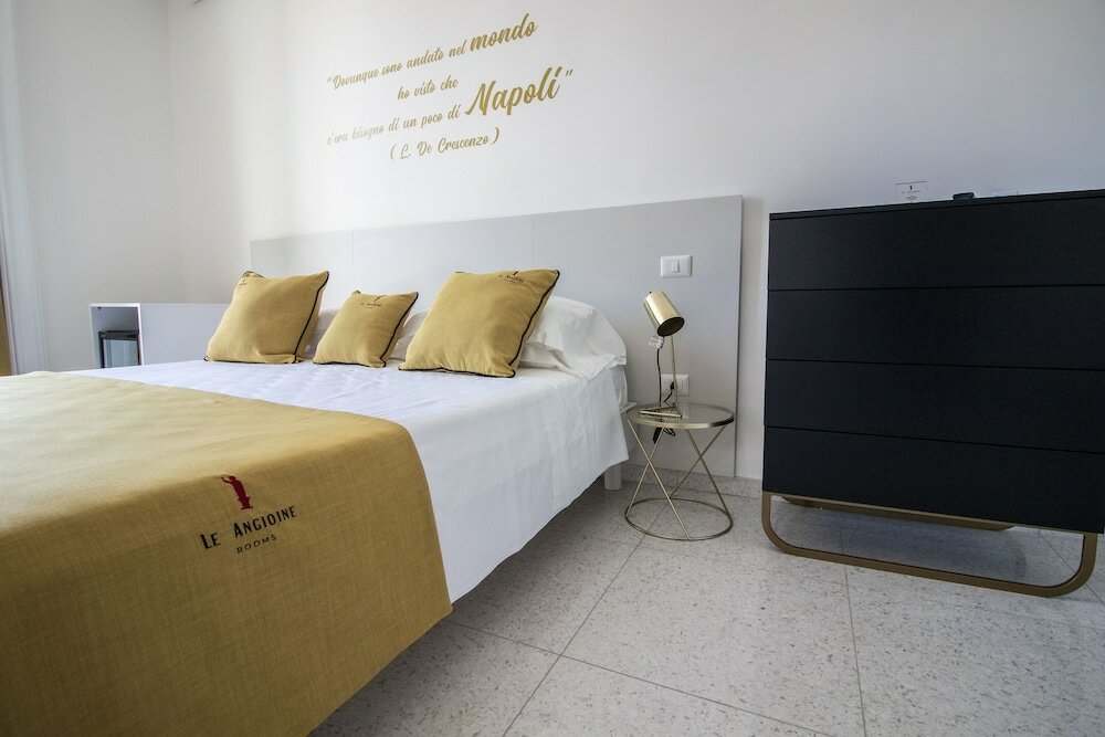 Фото Le Angioine Rooms