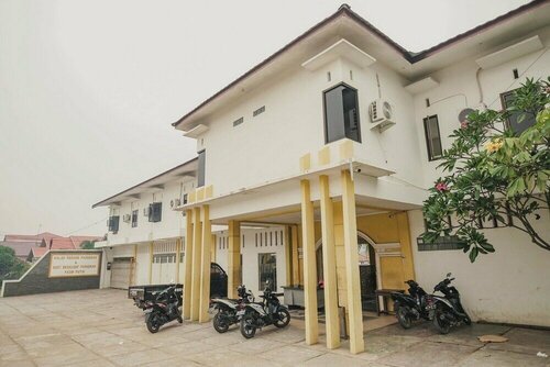 Гостиница RedDoorz Syariah @ Pasir Putih Jambi в Джамби