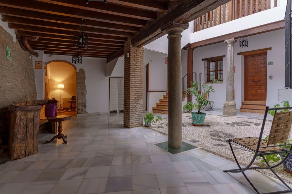 Фото Suites Casa De Las Columnas