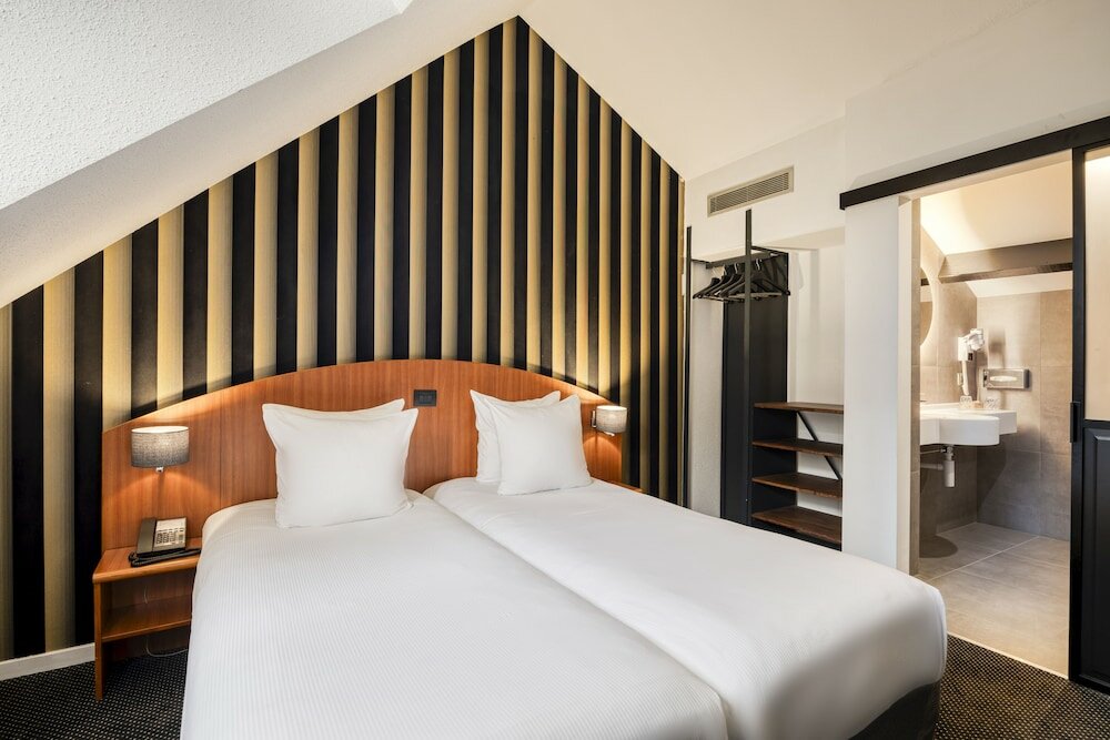 Фото Aris Grand-Place Hotel