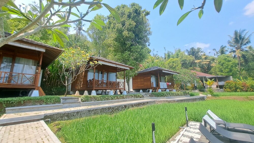 Фото Bali De Pardis Cottage