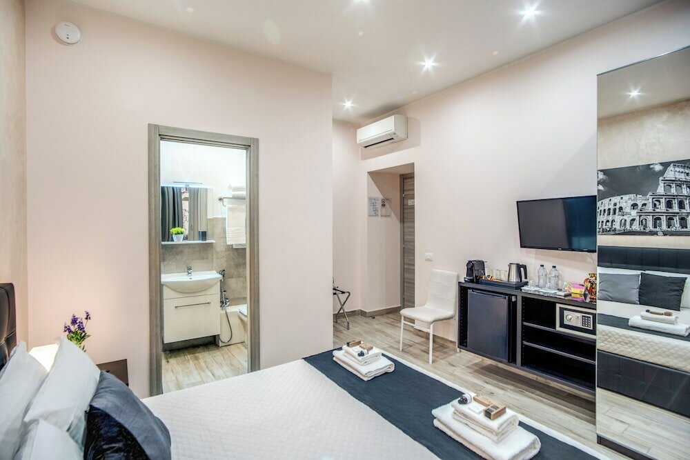 Фото Tacito 23 - Luxury rooms