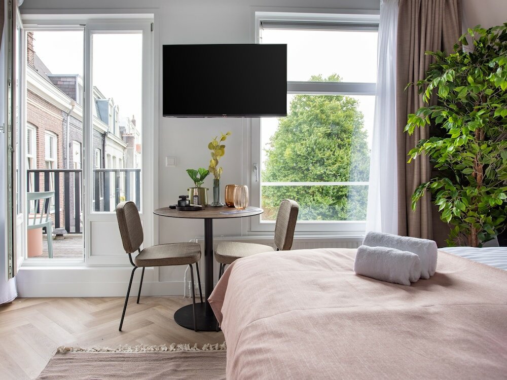 Фото Limehome Amsterdam Hemonystraat