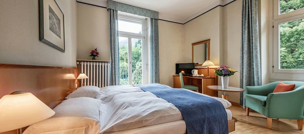 Фото E-Rooms Minusio