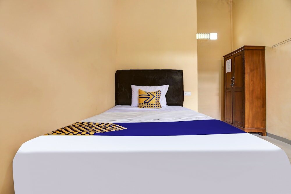 Фото Spot On 90433 Serasi Kost