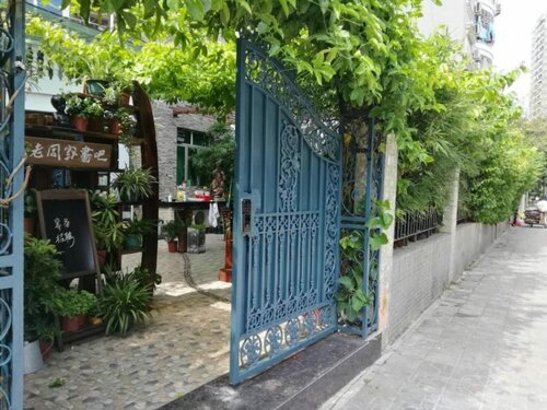 Гостиница LaozhouJia Hostel в Юньлоне