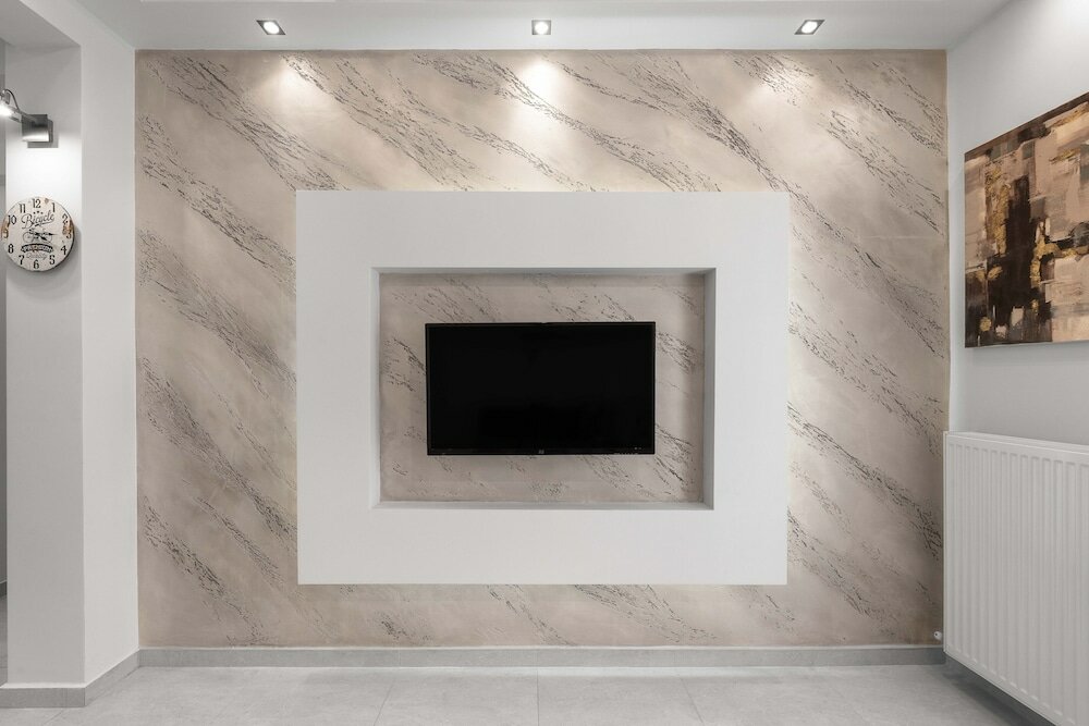 Фото Cosmopolitan Apartments Nilie Suites & Aprts